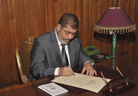 Mohamed Morsi ratifie la nouvelle Constitution égyptienne mohamed morsi ratifie nouvelle constitution egyptienne Mohamed Morsi ratifie la nouvelle Constitution égyptienne