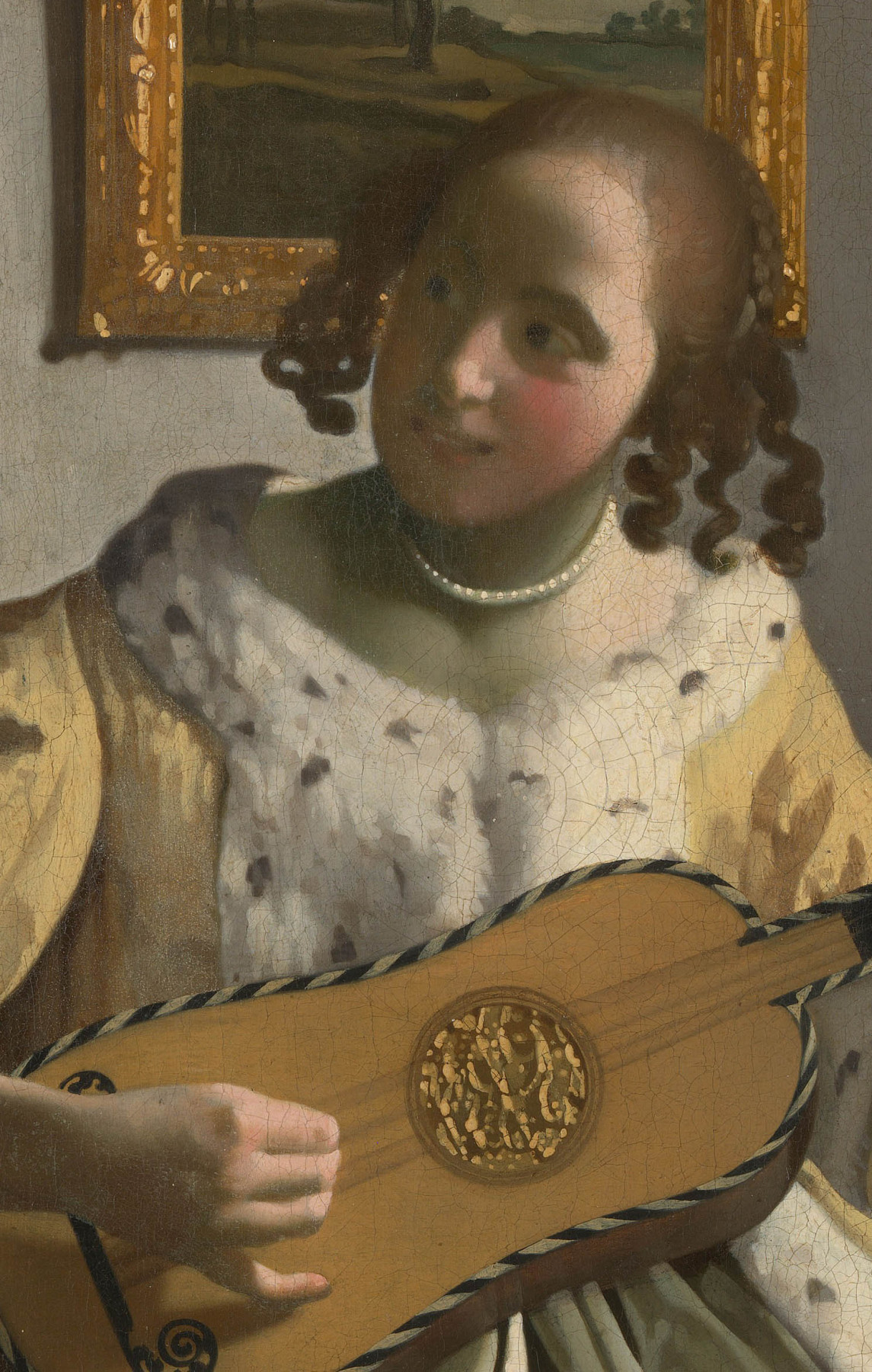 Une femme jouant de la guitare détail 2jpg.jpg