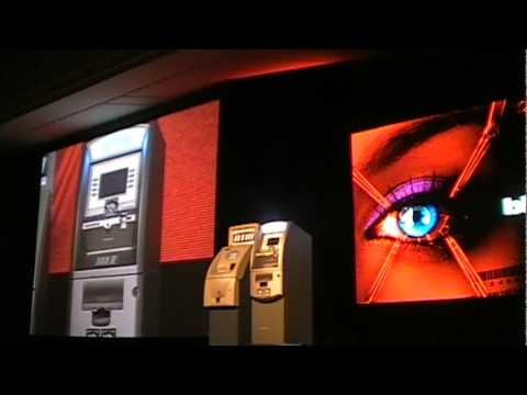 SecurityWeek.Com - Barnaby Jack Hacks ATM At Black Hat